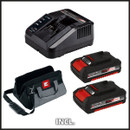 Black and red power tool set includes a dual battery charger, two rechargeable batteries, and a grey and black carrying bag with a shoulder strap.