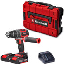Red and black cordless drill set with two batteries, a charger, and a sturdy toolbox. The design is sleek, conveying durability and efficiency.