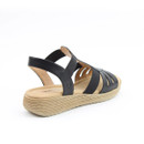 A back view of a strappy black sandal on a white background