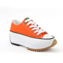 A front view of an orange platform trainer on a white background