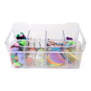 Multi-compartment clear tray used for arts and crafts storage, filled with pom-poms, paint bottles, glue sticks, and colourful foam shapes.