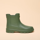 Side profile of a khaki-green ankle-height rain boot, showcasing its smooth, waterproof upper and chunky treaded sole.
