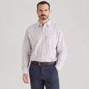 Men’s long-sleeve Sedgebrook check shirt in white with brown and navy grid pattern, worn tucked into navy trousers.