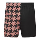 Back view of two-tone women's shorts with rose houndstooth print and solid black panel.