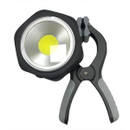 LED work light with a circular, reflective lens and a black plastic housing, attached to a sturdy black clamp with grey rubber grips.