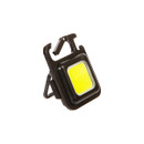 A compact black LED work light with a bright yellow light panel, featuring a clip for easy attachment. The sleek design suggests portability and efficiency.