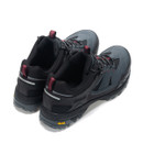 Back-angled view of grey hiking shoes showing padded collars, heel support, and Vibram outsole branding.