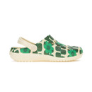 Right side view of cream clogs with green floral geometric design