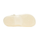 Cream clog outsole with textured grip pattern