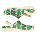 Pair of cream clogs with green flower and square pattern, side view