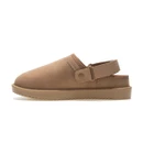 Side profile of a tan suede clog with adjustable heel strap, soft upper and low-profile textured sole.