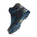 Angled view of hiking boot outsole highlighting aggressive grip and stability.