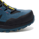 Close-up of blue hiking boot toe box with reinforced rubber protection.
