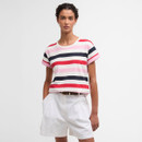 Model wearing a short-sleeved, crew-neck T-shirt with bold horizontal stripes in white, navy, red and pink, paired with white shorts.
