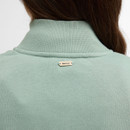 Close-up of the back neck, showing the ribbed collar and small Barbour metal badge.
