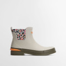 Side profile of cream Barbour Chelsea wellington boot featuring leopard print elastic side panel and low stacked sole.