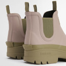 Rear view of Barbour blush pink ankle wellington boots highlighting pull tabs, stitched heel panels and chunky khaki outsole.