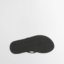 Outsole view of black flip flop with herringbone tread pattern for grip
