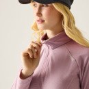 Close-up of the lilac half-zip fleece collar and zip detail.