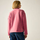 Rear view of model wearing the Slate Rose fleece jacket.
