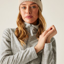 Close-up of the light grey marl fleece jacket’s high collar and zip pull, with the model wearing a cream beanie.