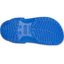 Outsole view of a blue bolt Crocs Children's Classic Clog showing textured tread pattern for grip and durability.