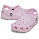 Light pink Crocs Classic Clog with ventilation holes and adjustable heel strap, shown in angled front view on white background.