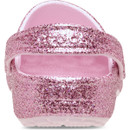Rear view of pink glitter Crocs clog showing heel strap and textured outsole edge