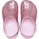 Top-down view of pink glitter Crocs clogs showing cushioned footbed and ventilation holes