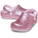 Pink glitter Crocs clogs with ventilation holes and adjustable heel strap on a white background
