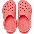 Top-down view of a pair of guava pink Crocs Classic Clogs showing the cushioned footbed texture and perforated toe box.