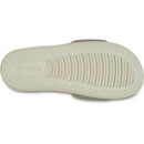 Sole view of a bone/taupe coloured Crocs slide sandal displaying the textured tread pattern and Crocs logo imprint.