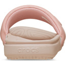Opposite side view of powder pink Crocs slide sandal highlighting embossed logo strap and low-profile sole