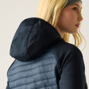 Rear three-quarter close-up showing the hood and quilted back panel of the navy hybrid padded jacket.