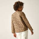 Back view of the tan leopard-print quilted jacket on the model, showing the all-over leopard print and quilting.