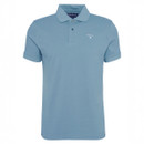 Light blue polo shirt with short sleeves and a collar. Features a small embroidered Barbour logo on the chest. Casual and classic design.
