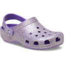 Purple glitter Crocs Classic Clog with ventilation holes and heel strap, shown from a front three-quarter angle.