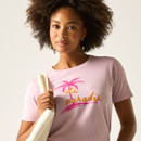 Close-up of a woman wearing a light pink graphic T-shirt, showing the palm tree print and neckline detail.