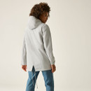 Back view of women’s light grey hooded waterproof jacket.