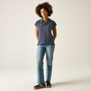 Women’s navy and white striped short-sleeve polo top, worn with blue jeans.