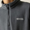 A close-up of a grey fleece jacket with a half-zip collar, featuring the "Regatta Great Outdoors" logo embroidered in white on the chest.