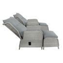 Side view of two grey woven rattan reclining chairs in reclined position with pale blue cushions and footrests, shown on a white background