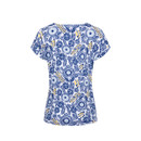 Back view of a white short-sleeve printed tee with blue floral and leaf pattern and small yellow accents.