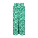 Green and white high-waisted wide-leg trousers with an all-over geometric leaf print.