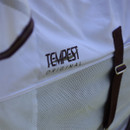 Tempest Original logo on a white fly rug with mesh panel and dark trim, shown in close-up.