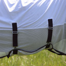 Adjustable surcingle straps and mesh belly panel on a white horse fly sheet, shown in detail.