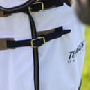 Detail of the front chest fastening straps and buckles on a white Tempest Original fly rug.