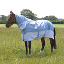 Horse wearing a light blue and white turnout rug with neck cover standing in a grassy field.