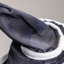 Detailed close-up of the breathable mesh ear section on a FlyGuard fly mask with soft white edging.