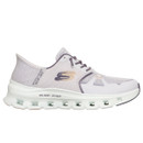 Light purple athletic shoe with mesh fabric, lace-up design, and a thick, white sole featuring air openings. It has a sporty and modern style.